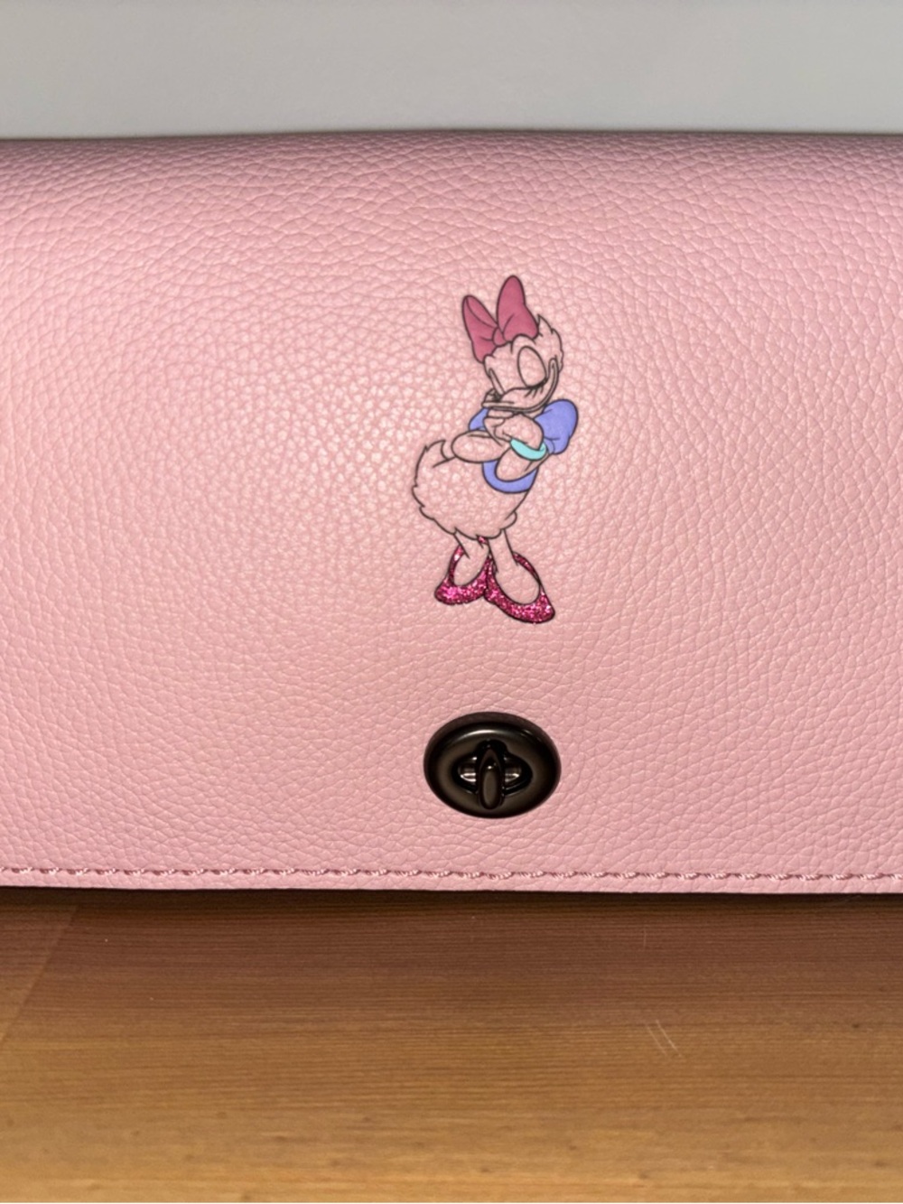 Pink Coach 1941 Dinky with Daisy Duck design - Leather Crossbody Clutch